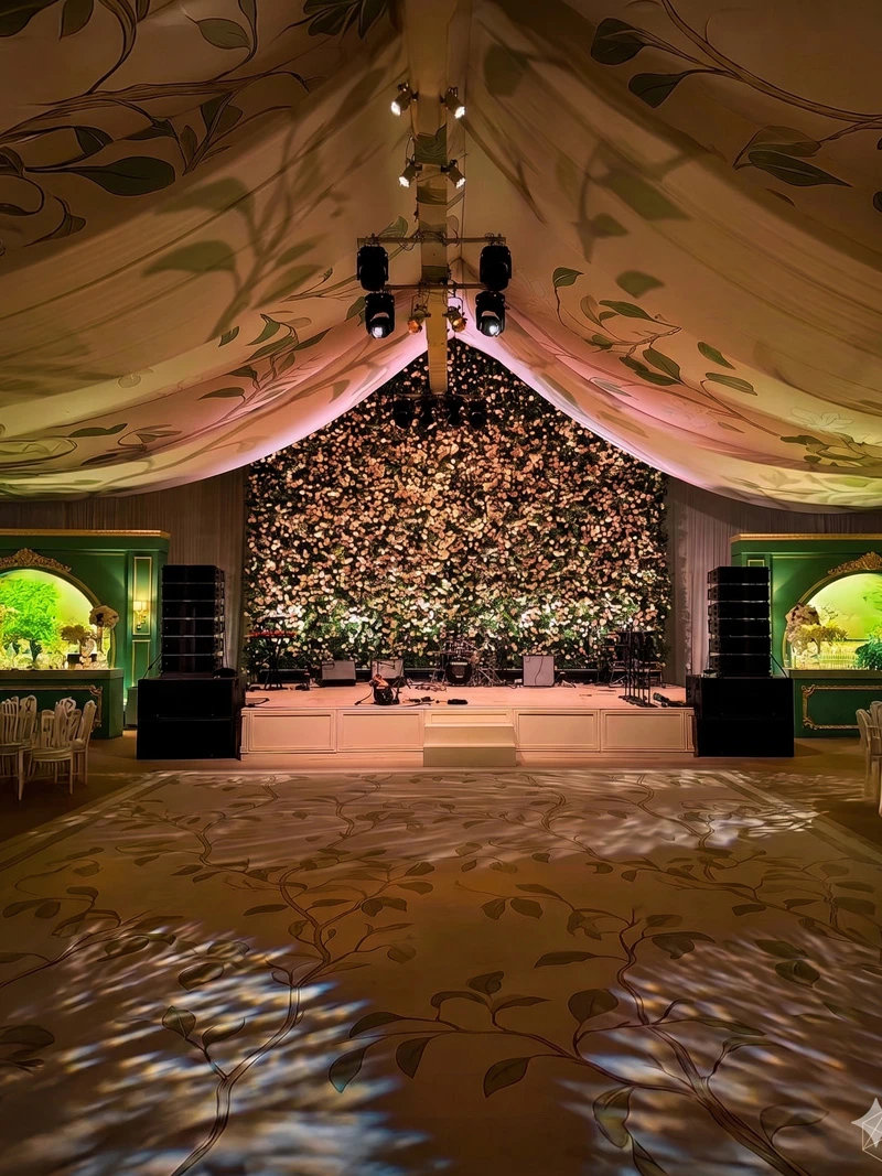 Complex structural venue transformation and premium tent setups on the beach