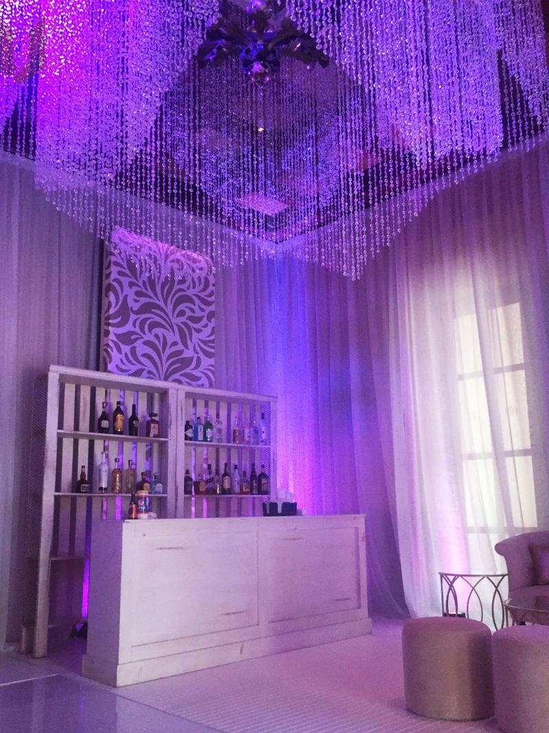 Complex structural venue transformation and premium tent setups on the beach